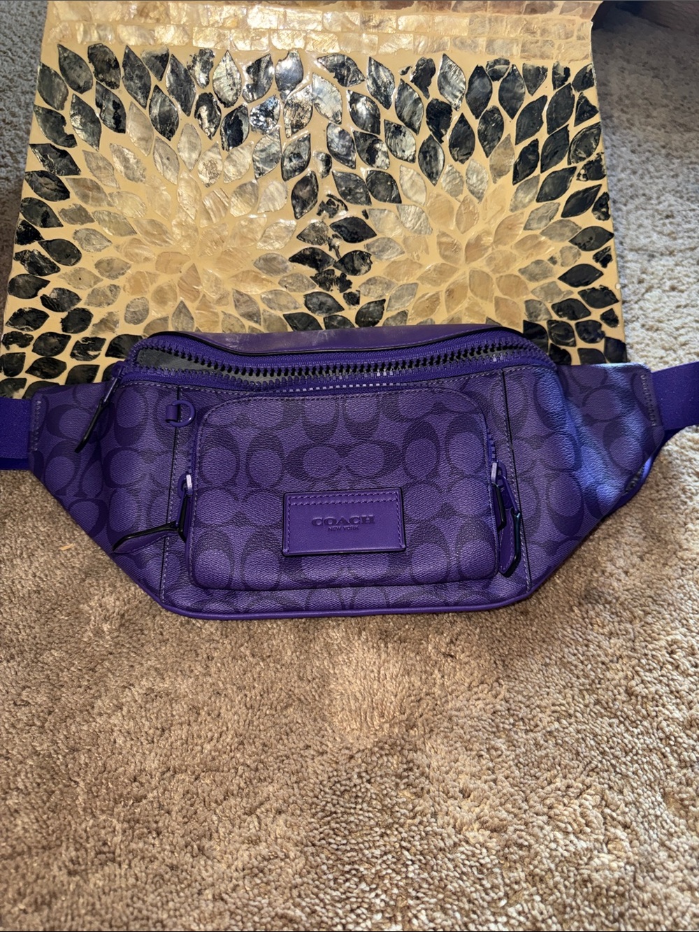 Coach Purple Signature Track Belt Bag in a sport purple signature canvas